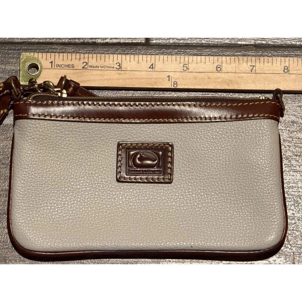 Dooney & Bourke Pebbled Leather Wristlet Cream Brown Duck Logo Wallet Clutch